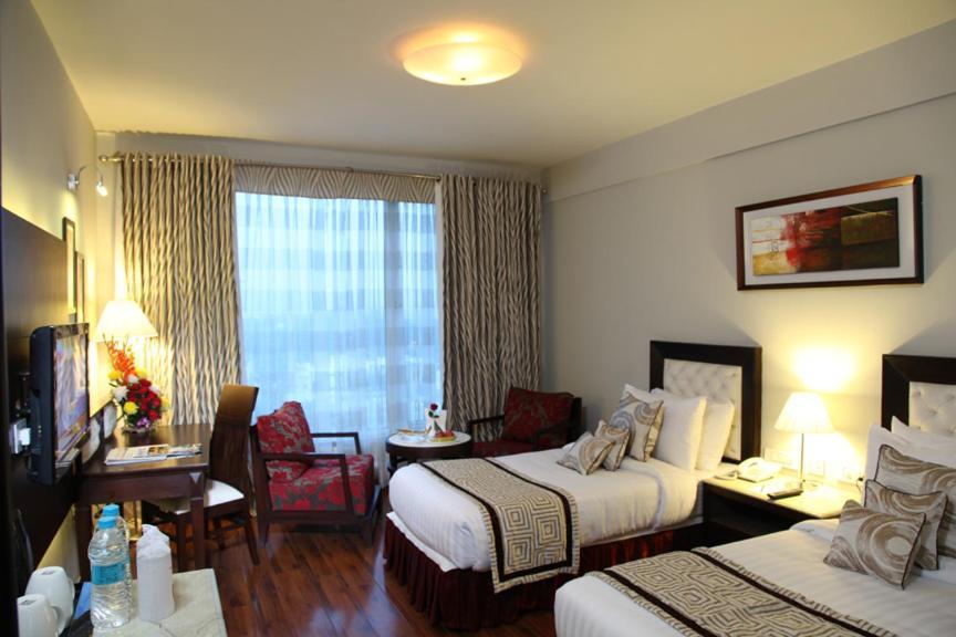 Treehouse Queens Pearl Gurgaon Eksteriør bilde